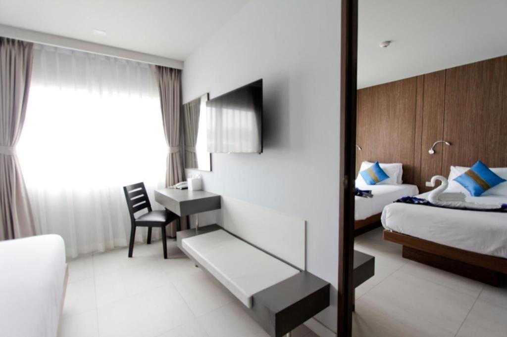 Elegancy Sansabai Hotel Patong Exterior photo